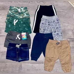 Baby boy size 0-3 months. 4 pairs of shorts and 4 pants.